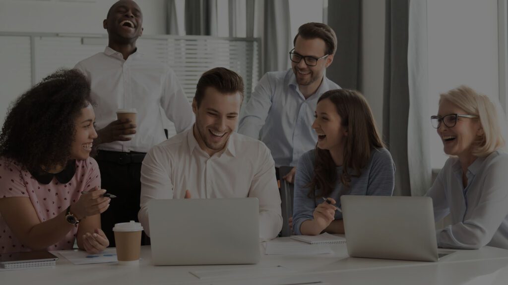 office workers laughing together